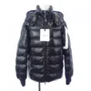 Moncler winter down jacket with "M" detail.